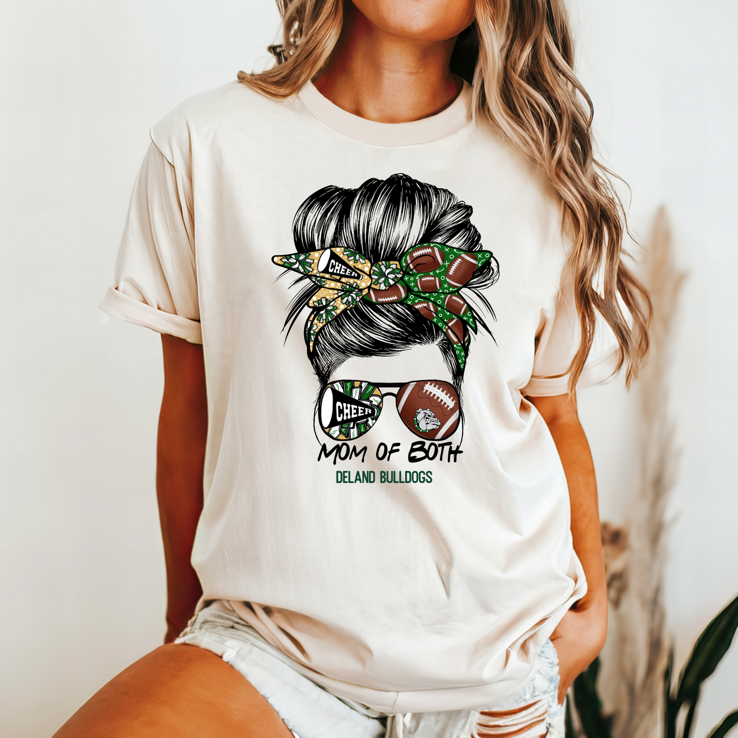 Mom of Both DeLand Bulldogs Messy Bun Football and Cheer Shirt - Green & Gold