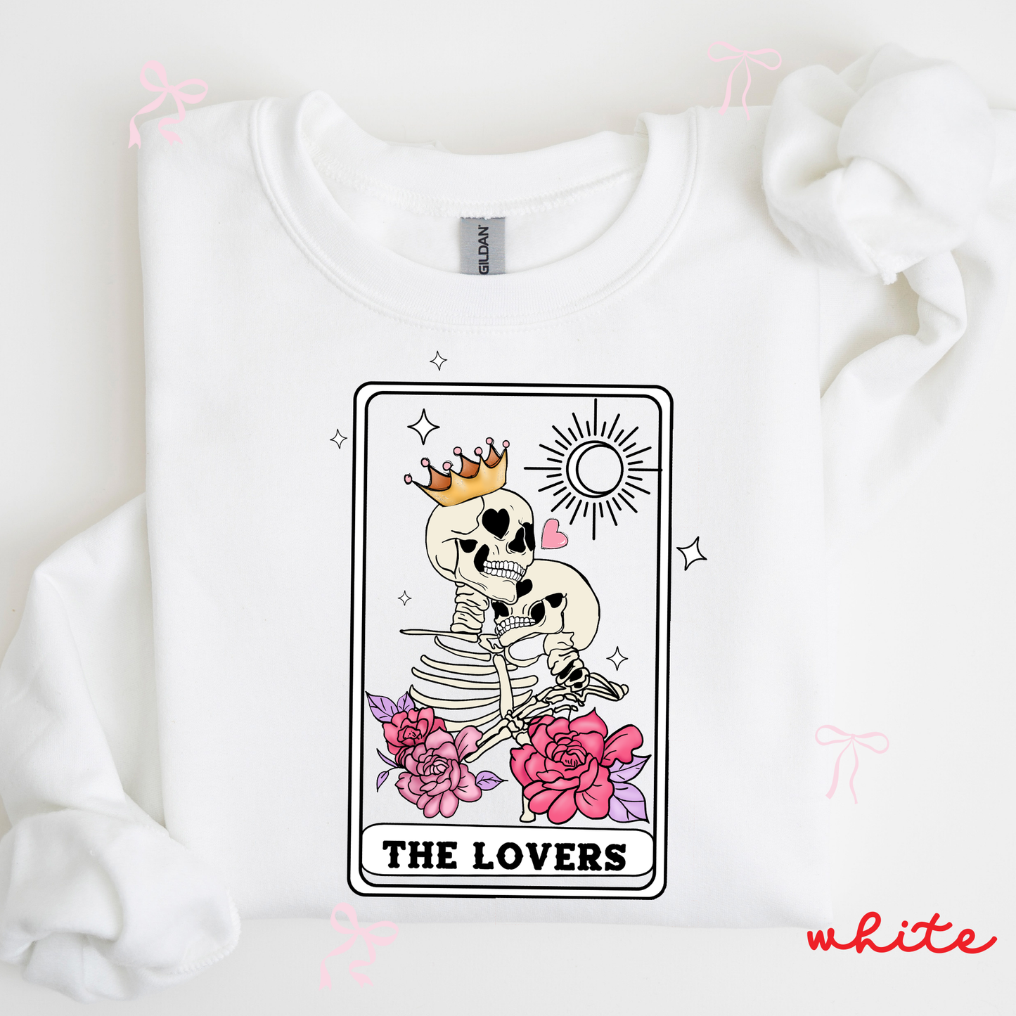 White sweatshirt with a skeleton couple and 'The Lovers' tarot card design on a white background.