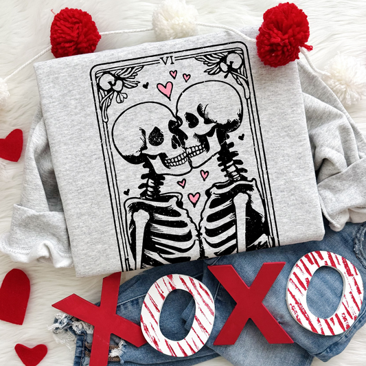 The Lovers Skeleton Sweatshirt features a tarot card–inspired design