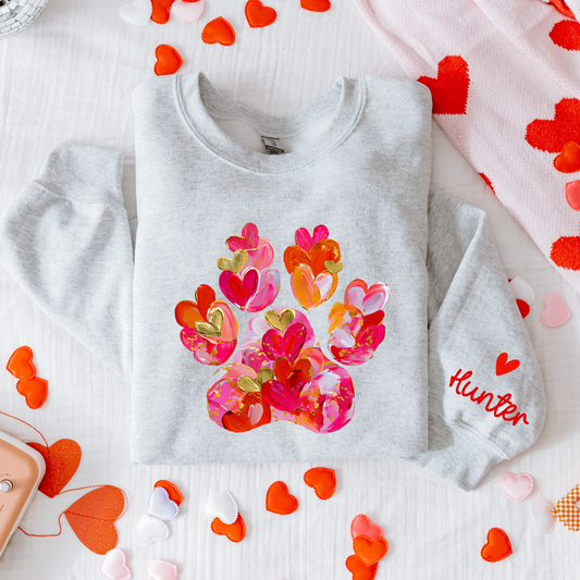 Gray sweatshirt with colorful heart design and 'Hunter' text on a white background with heart decorations.