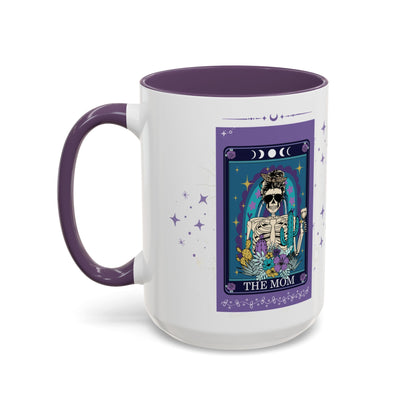 Mug with a purple interior and handle, featuring a tarot card design with a skeleton and text on a white background.