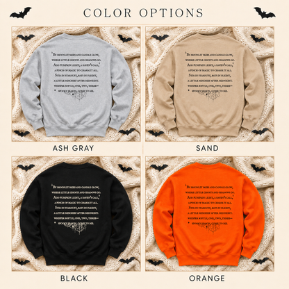 A color options graphic showing four sweatshirts laid flat on a textured cream background with bat illustrations and the heading 'COLOR OPTIONS.' The sweatshirts are labeled Ash Gray, Sand, Black, and Orange, each with a small white text print on the back.