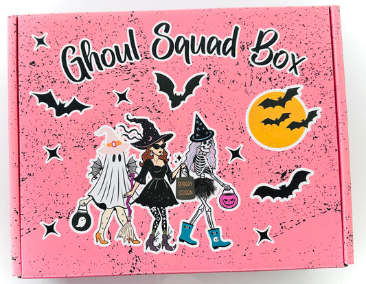 Pink box with 'Ghoul Squad Box' text and Halloween-themed illustrations on a white background