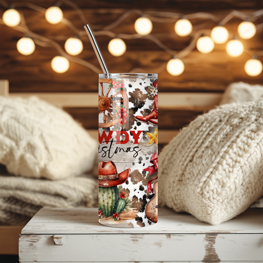 Tumbler with Christmas design featuring cacti and 'Merry Christmas' text, placed on a wooden surface with soft lighting.