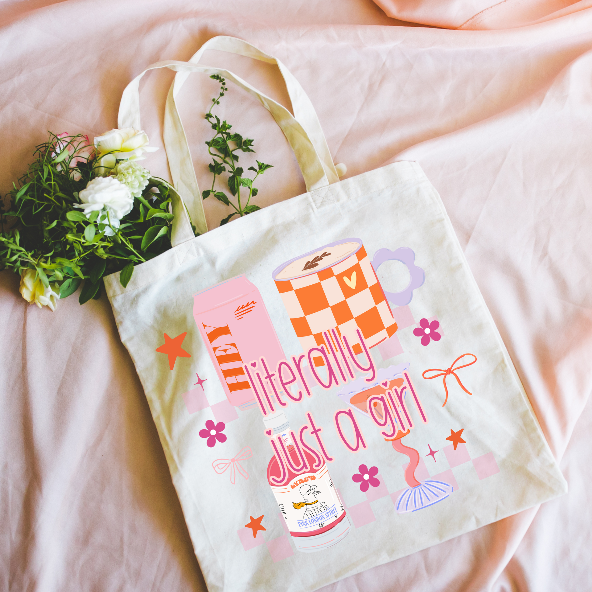 Close up of Literally Just a Girl tote bag design on canvas