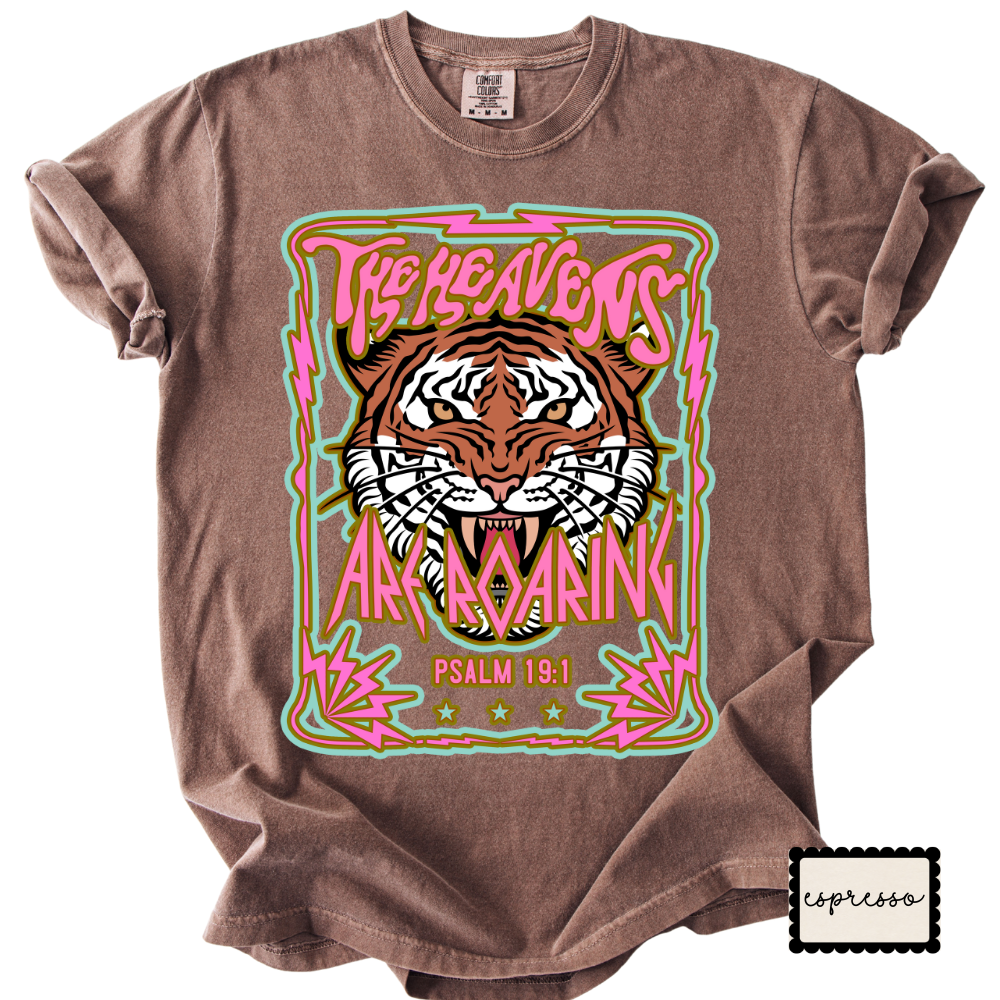 Brown t-shirt with a tiger graphic and text on a white background