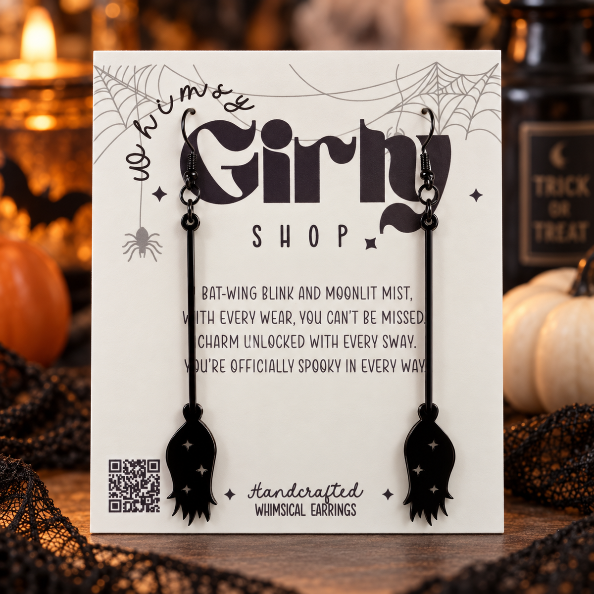 Black spooky dangle earrings on Whimsy Girly display card