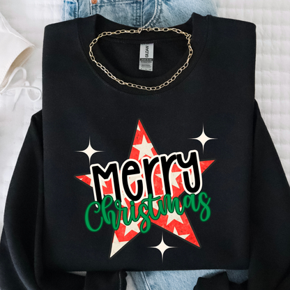 Black Christmas sweatshirt with red star and Merry Christmas design styled in flat lay.