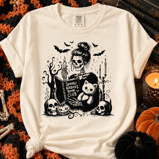 Ivory Comfort Colors Halloween T-shirt featuring Spooky Readers Book Club Skeleton