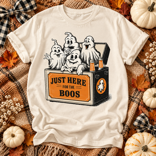 Ivory Just Here for the Boos T-shirt with four ghosts peeking from a black and orange drink carton