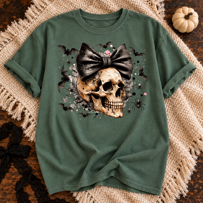 Moss T-shirt featuring Dark Darling skull with bow graphic on a cozy fall flat lay