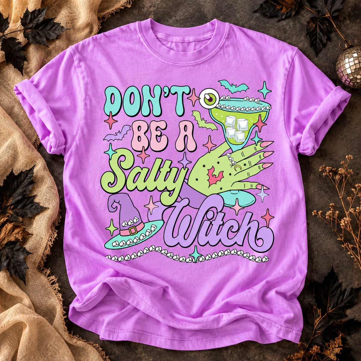 Neon Violet Don't Be a Salty Witch T-shirt with neon green witch hand, margarita glass and pastel lettering