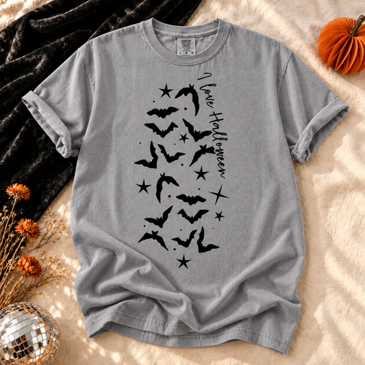 Gray T-shirt featuring Flying Into Spooky Season bat graphic on a cozy fall flat lay