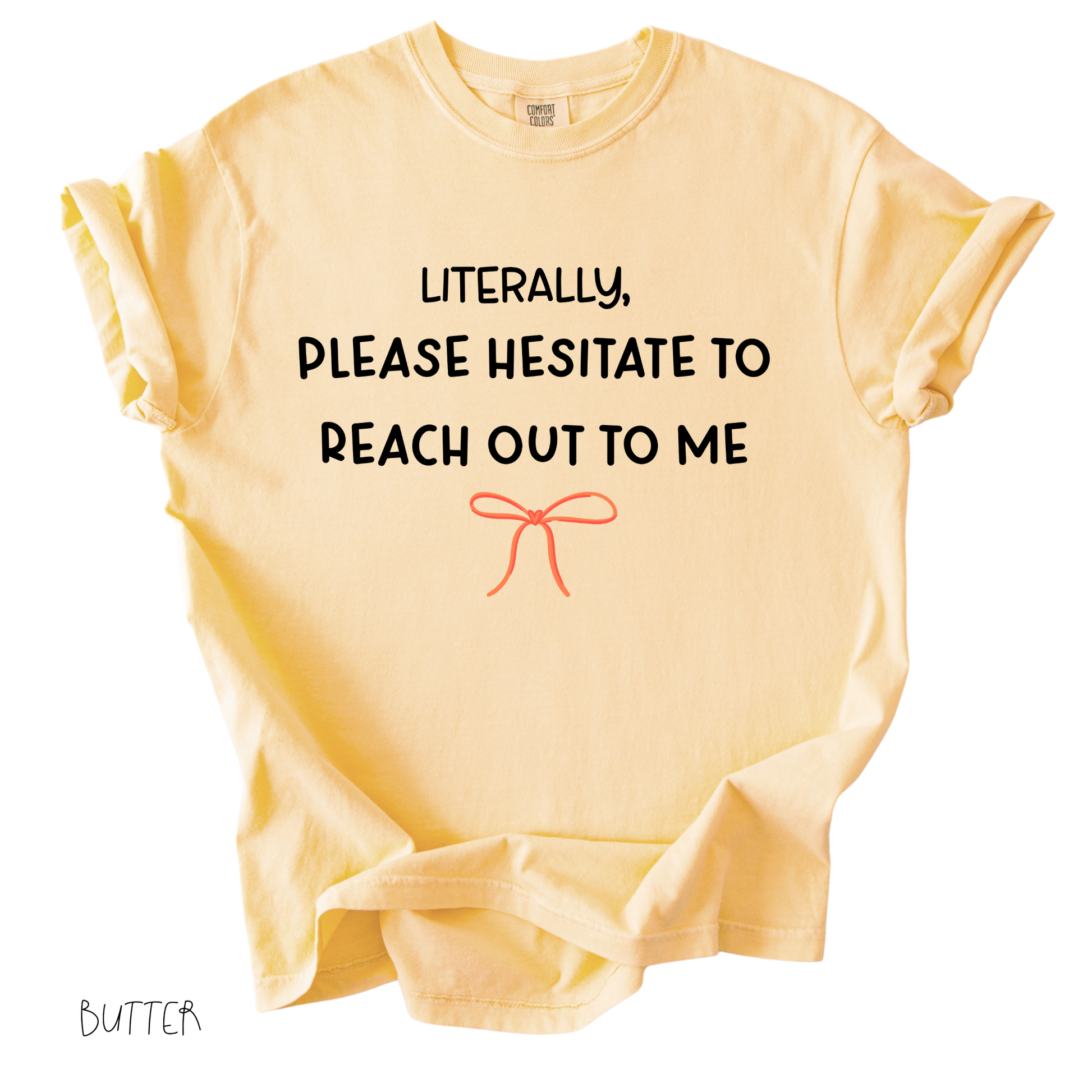 Funny girly graphic tee that says literally please hesitate to reach out to me on butter colored shirt