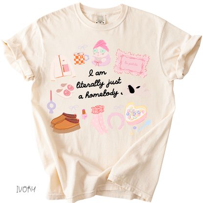 ivory Literally Just a Homebody graphic tee with cozy doodles on a relaxed fit women’s t-shirt
