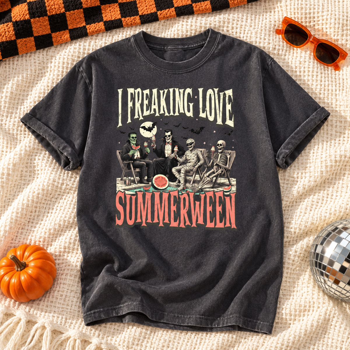 Pepper T-shirt featuring I Freaking Love Summerween skeleton beach graphic on a cozy flat lay