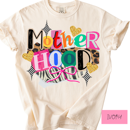 Ivory t-shirt with colorful 'Mother Hood' text and animal print accents on a white background.