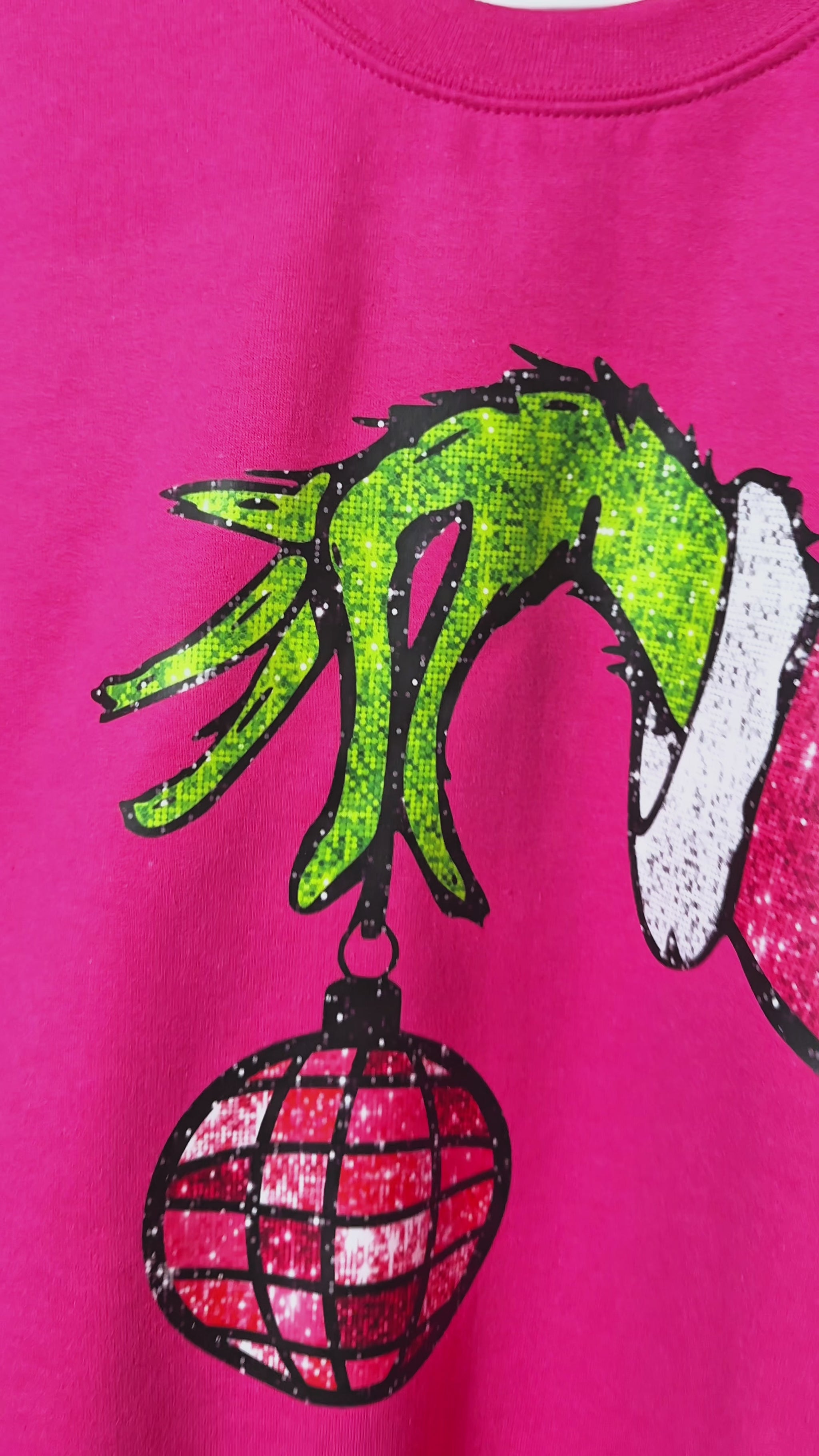Grinch hand Christmas sweatshirt pink color