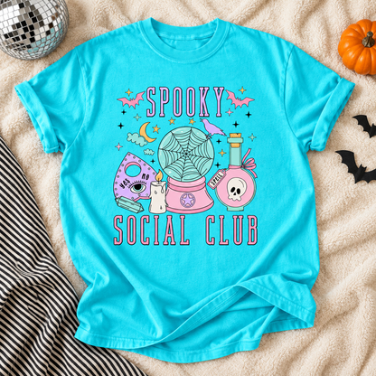 Lagoon T-shirt featuring Spooky Social Club ghost radio graphic on a Halloween flat lay